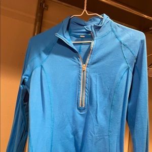 Lululemon quarter zip in great condition. Size 2/4